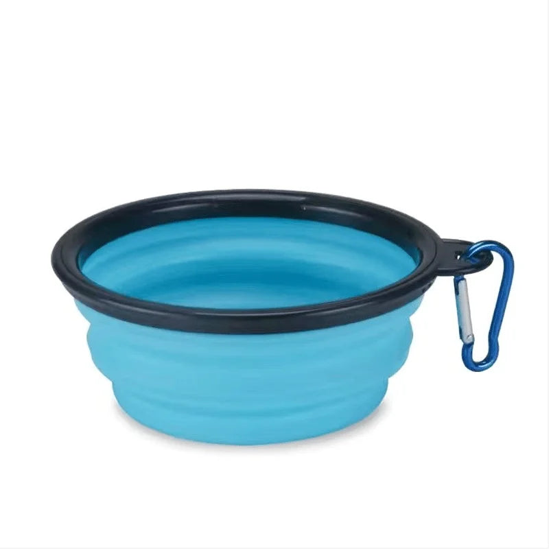 Collapsible Travel Bowl in Sky Blue — the open bowl with its carabiner clip on a white background
