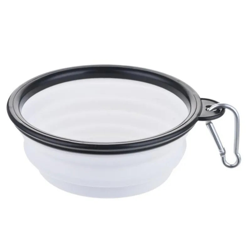Collapsible Travel Bowl in Cream — the open bowl with its carabiner clip on a white background