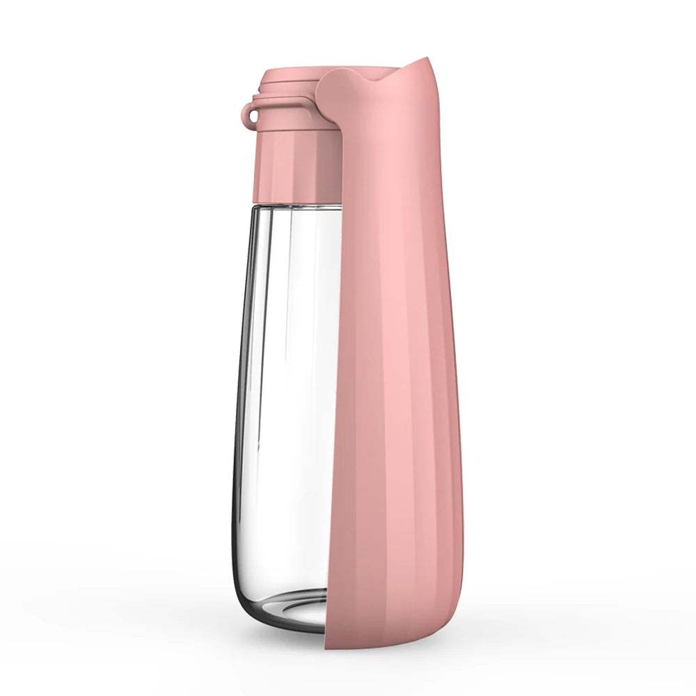 Travel Water Bottle in Blush — the bottle standing upright on a white background