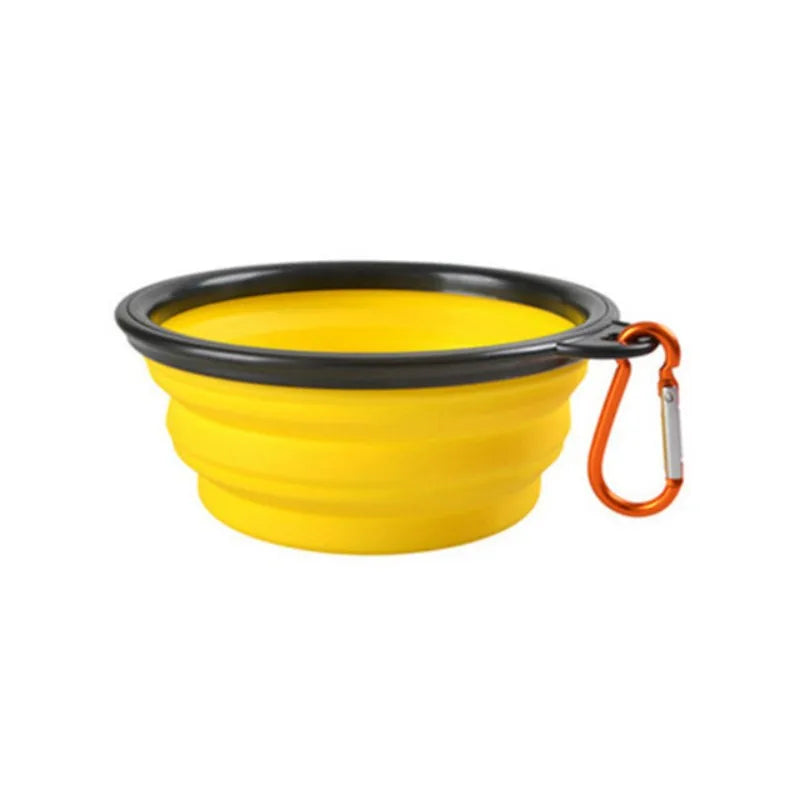 Collapsible Travel Bowl in Yellow — the open bowl with its carabiner clip on a white background