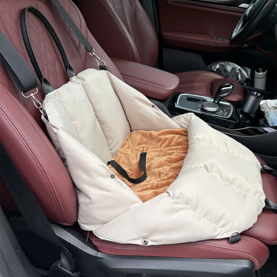 Soft-Sided Pet Carrier in Sand — car seat setup showing the plush cushion