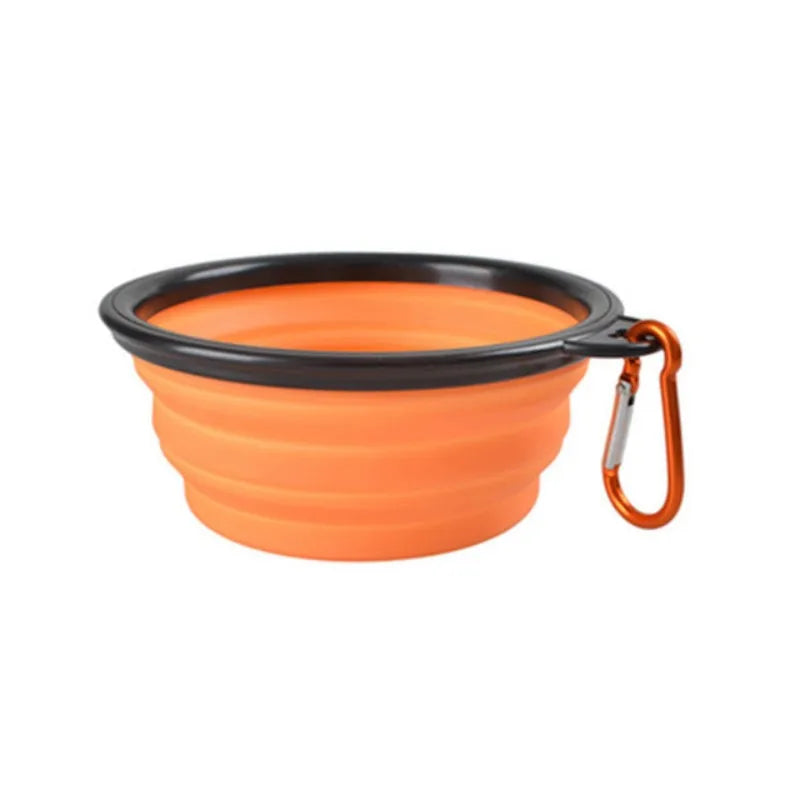 Collapsible Travel Bowl in Orange — the open bowl with its carabiner clip on a white background