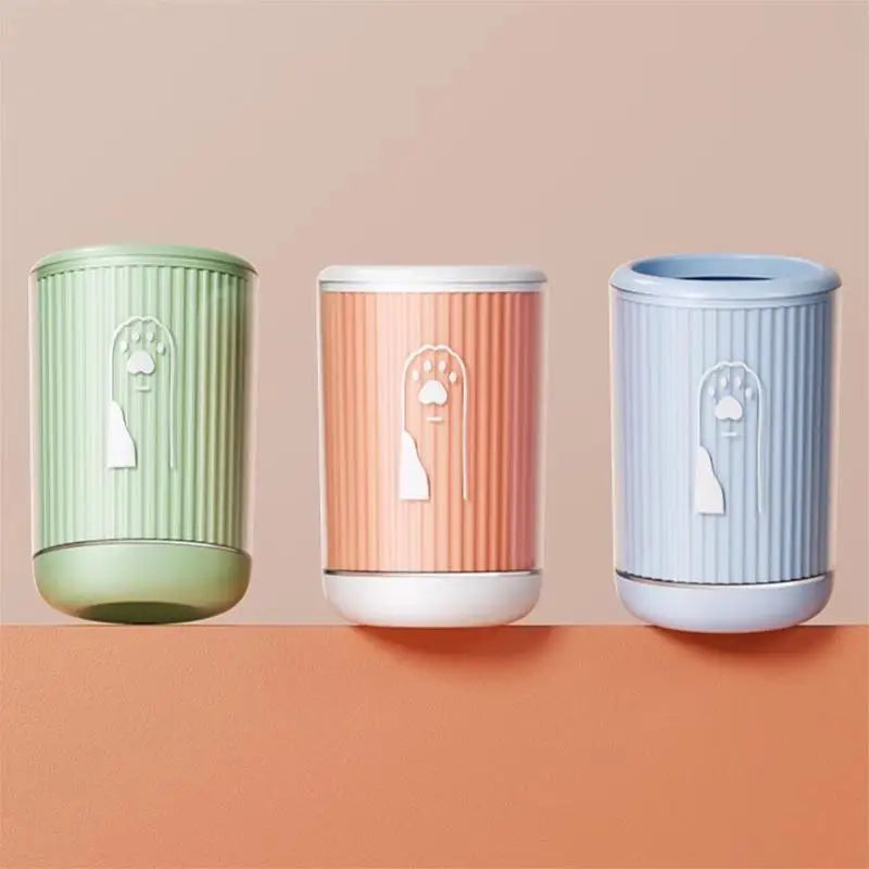 Paw Cleaning Cup in Sage, Orange and Blue — three cups side by side on a terracotta shelf