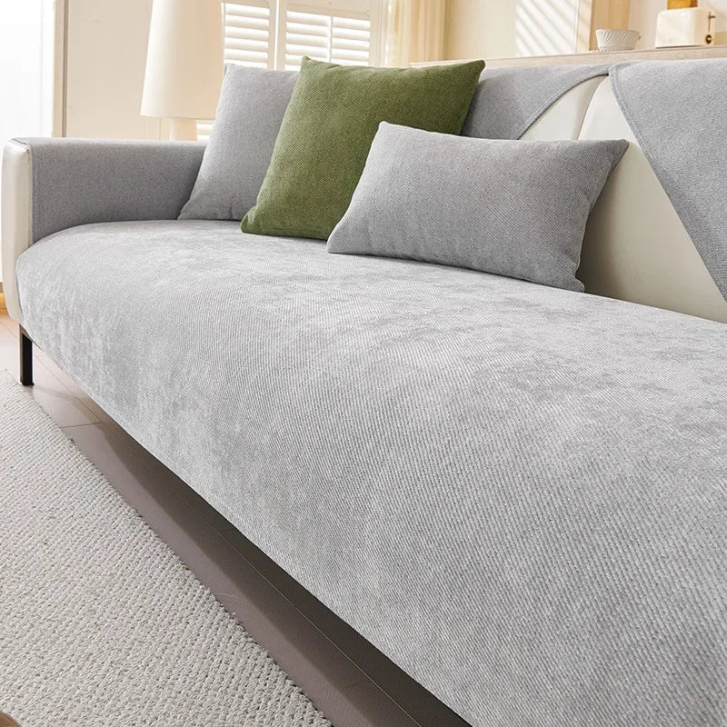 Chenille Sofa Cover in Mist — covering the seat and back of a cream sofa