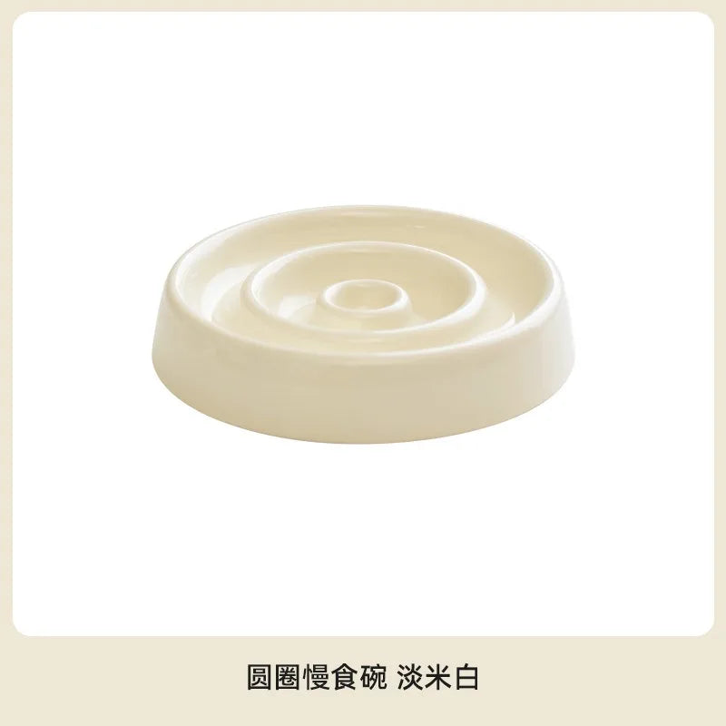 Ceramic Slow Feeder Bowl in Cream — studio view of the concentric ridges on a white background