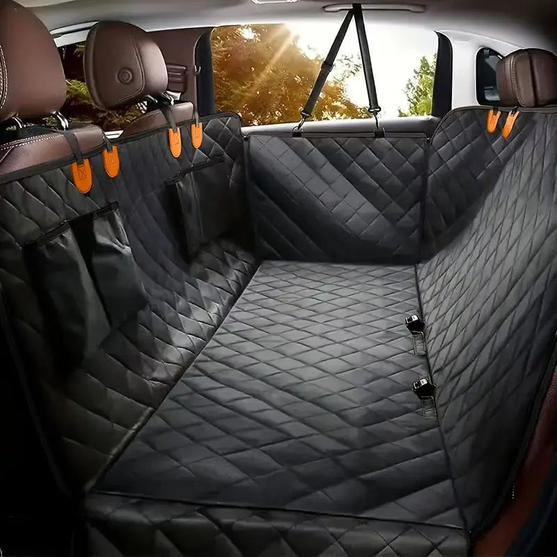 Back Seat Hammock in Amber Accents — black quilted cover with amber headrest tabs fitted in the back seat