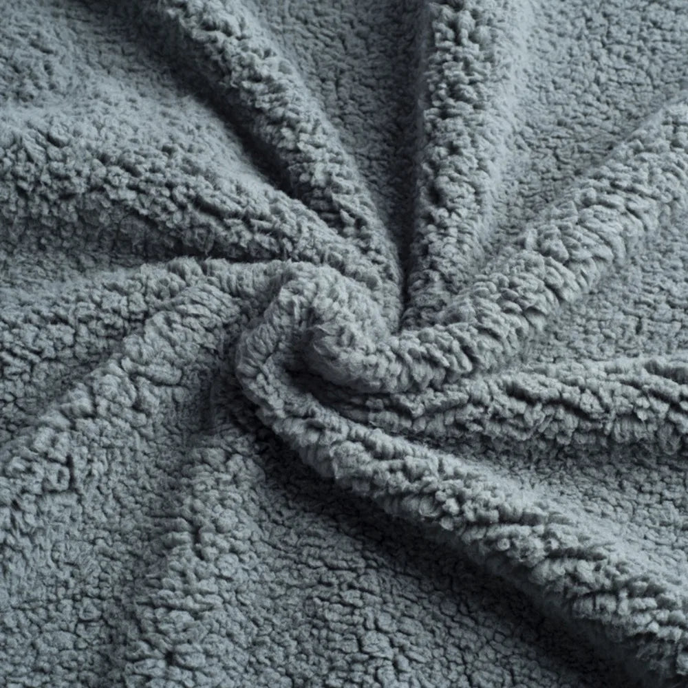 Reversible Sherpa Throw in Stone — close-up of the sherpa fleece texture