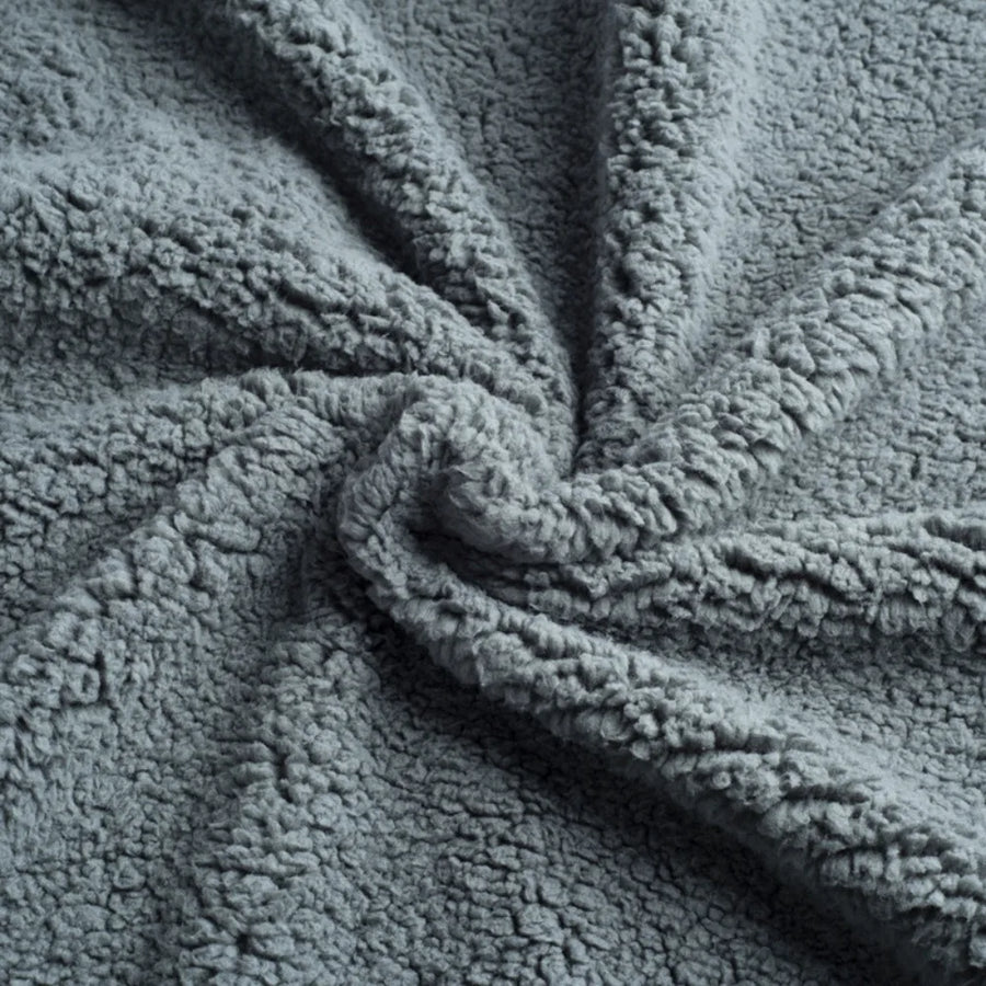 Reversible Sherpa Throw in Stone — close-up of the sherpa fleece texture