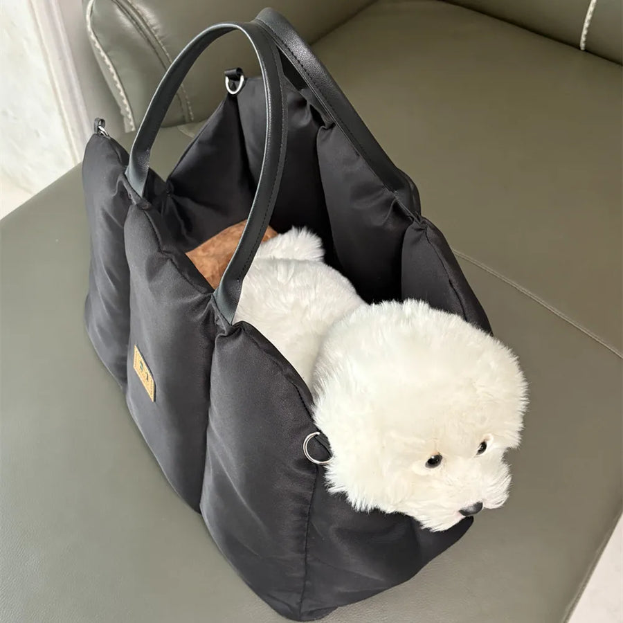 Soft-Sided Pet Carrier in Black — small dog resting inside the open tote