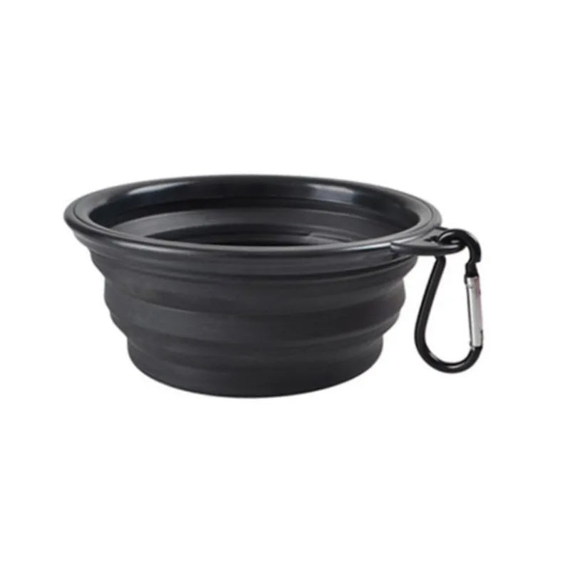Collapsible Travel Bowl in Black — the open bowl with its carabiner clip on a white background